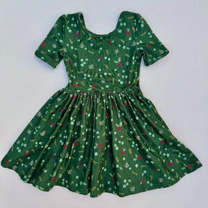 Girlhood (Little Stocking Co.) 12–18M Holiday A-Line | Short Sleeve | Festive Pr